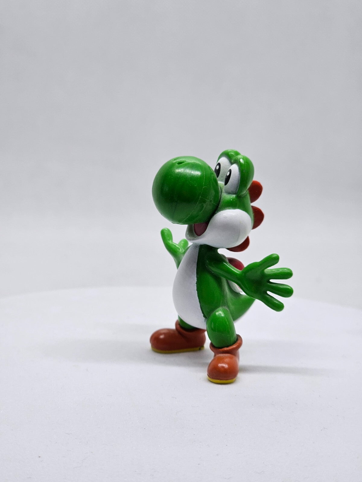 6974077