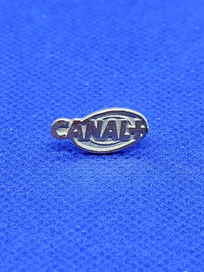 Pin's Canal+ Logo Télévision Métal Argenté Collection Publicitaire Rétro0