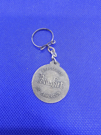 Porte‑clés vintage Brasseries Beaufort du Cameroun – métal ancien1