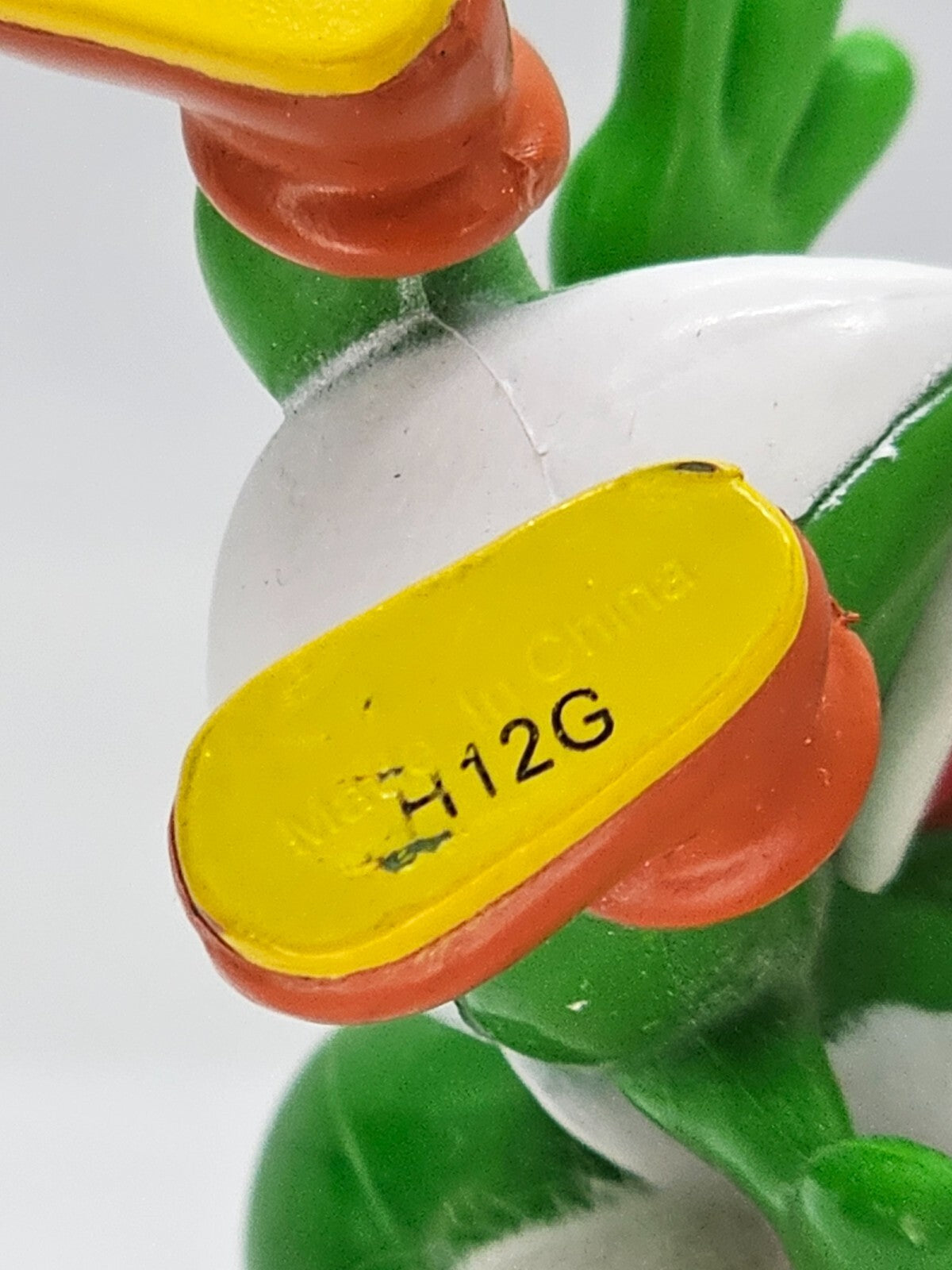 6974077